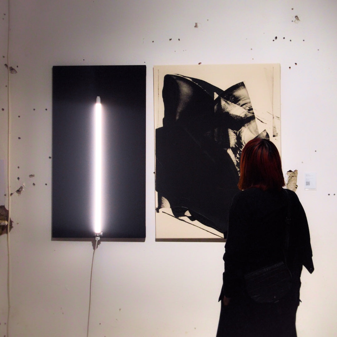 Guest viewing Art Work at Art Embassy in Berlin-Kreuzberg